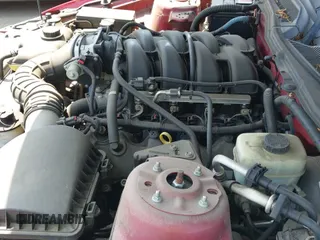 ✅ 2005 Ford Mustang GT Deluxe • VIN: 1ZVFT82H355164563 • Lot: 42190685. Listed on IAAI with 40,341 mi. Free auction sales archive from the USA and detailed vehicle history report at DreamBid. Image 12.