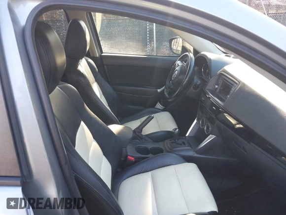 ✅ 2014 Mazda CX-5 Touring • VIN: JM3KE2CY0E0351500 • Lot: 44201819. Wystawiony na IAAI z przebiegiem 235 325 mil. Bezpłatny archiwum sprzedaży aukcyjnych z USA i szczegółowy raport historii pojazdu na DreamBid. Zdjęcie 5.