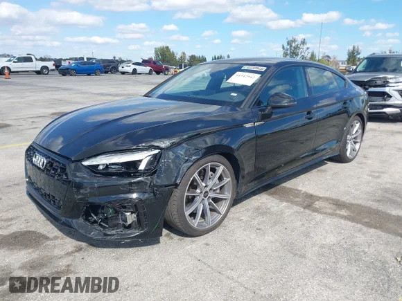 ✅ 2025 Audi A5 Sportback S line Premium • VIN: WAUDACF56SA008018 • Лот: 44342942. Опубліковано раніше на IAAI з пробігом 26 363 миль. Безкоштовний доступ до архіву аукціонних продажів зі США та докладний звіт про історію автомобіля на DreamBid. Зображення 2.