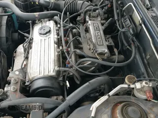 ✅ 1992 Mitsubishi Mirage • VIN: 4A3CU26A2NE030752 • Lot: 43037504. Wystawiony na IAAI z przebiegiem 93 053 mil. Bezpłatny archiwum sprzedaży aukcyjnych z USA i szczegółowy raport historii pojazdu na DreamBid. Zdjęcie 12.