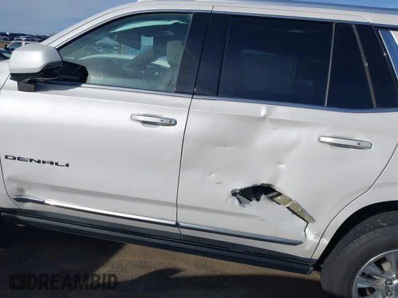 ✅ 2022 GMC Yukon Denali • VIN: 1GKS1DKL6NR285413 • Lot: 43920980. Wystawiony na IAAI z przebiegiem 74 029 mil. Bezpłatny archiwum sprzedaży aukcyjnych z USA i szczegółowy raport historii pojazdu na DreamBid. Zdjęcie 6.