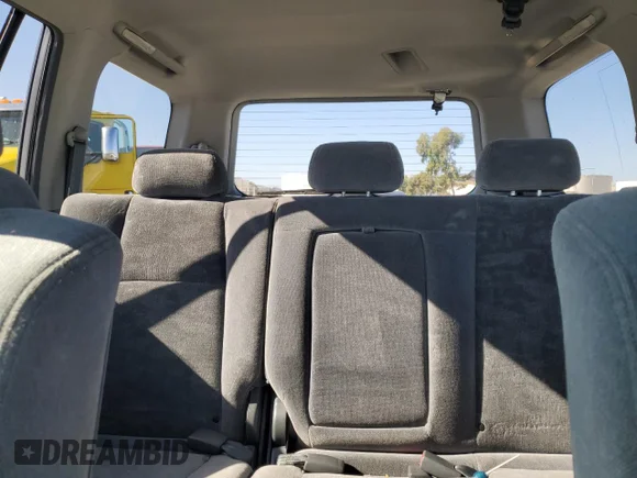 ✅ 2003 Honda Pilot EX • VIN: 2HKYF18473H594303 • Лот: 79424744. Опубліковано раніше на Copart з пробігом 190 474 миль. Безкоштовний доступ до архіву аукціонних продажів зі США та докладний звіт про історію автомобіля на DreamBid. Зображення 10.