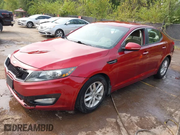 ✅ 2013 Kia Optima LX • VIN: 5XXGM4A79DG239315 • Lot: 43145152. Listed on IAAI with 167,730 mi. Free auction sales archive from the USA and detailed vehicle history report at DreamBid. Image 2.