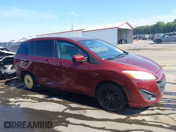 ✅ 2012 Mazda 5 Sport • VIN: JM1CW2BL2C0110096 • Lot: 45311647. Wystawiony na IAAI z przebiegiem 261 584 mil. Bezpłatny archiwum sprzedaży aukcyjnych z USA i szczegółowy raport historii pojazdu na DreamBid. Zdjęcie 1.