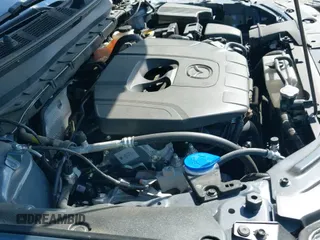 ✅ 2025 Mazda CX-5 S Carbon Edition • VIN: JM3KFBCM3S0637069 • Лот: 43310762. Опубликован ранее на IAAI с пробегом 6 957 миль. Бесплатный доступ к архиву аукционных продаж из США и подробный отчёт об истории автомобиля на DreamBid. Изображение 20.