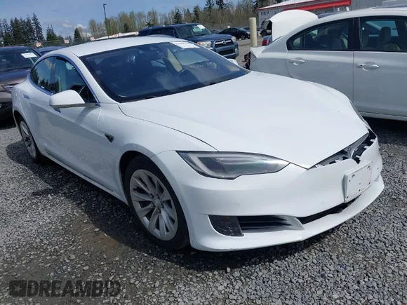✅ 2016 Tesla Model S 90D • VIN: 5YJSA1E28GF143859 • Lot: 41969776. Listed on IAAI with 62,321 mi. Free auction sales archive from the USA and detailed vehicle history report at DreamBid. Image 1.