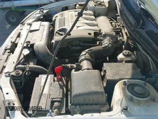 ✅ 2002 Kia Spectra • VIN: KNAFB121825132605 • Lot: 42512524. Listed on IAAI with 132,897 mi. Free auction sales archive from the USA and detailed vehicle history report at DreamBid. Image 12.