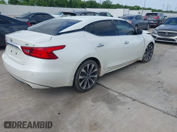 ✅ 2016 Nissan Maxima SL • VIN: 1N4AA6AP5GC424188 • Lot: 45458093. Listed on IAAI with 158,196 mi. Free auction sales archive from the USA and detailed vehicle history report at DreamBid. Image 4.