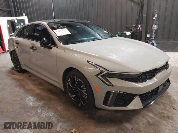 ✅ 2025 Kia K5 GT-Line • VIN: KNAG64J7XS5322888 • Лот: 42177874. Опубліковано раніше на IAAI з пробігом 3 684 миль. Безкоштовний доступ до архіву аукціонних продажів зі США та докладний звіт про історію автомобіля на DreamBid. Зображення 1.