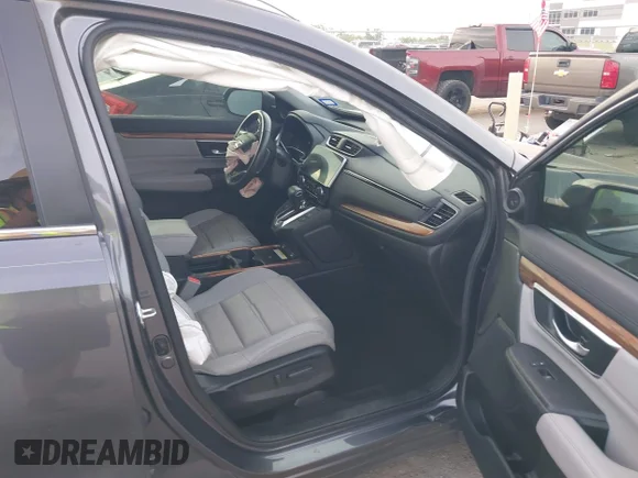 ✅ 2021 Honda CR-V Touring • VIN: 2HKRW2H91MH604136 • Lot: 45294533. Listed on IAAI with 42,708 mi. Free auction sales archive from the USA and detailed vehicle history report at DreamBid. Image 5.