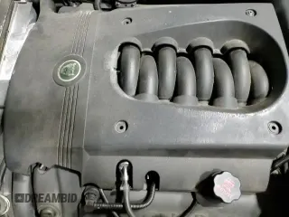 ✅ 2005 Jaguar XK XK8 • VIN: SAJDA42CX52A43323 • Lot: 84439154. Listed on Copart with 98,389 mi. Free auction sales archive from the USA and detailed vehicle history report at DreamBid. Image 13.