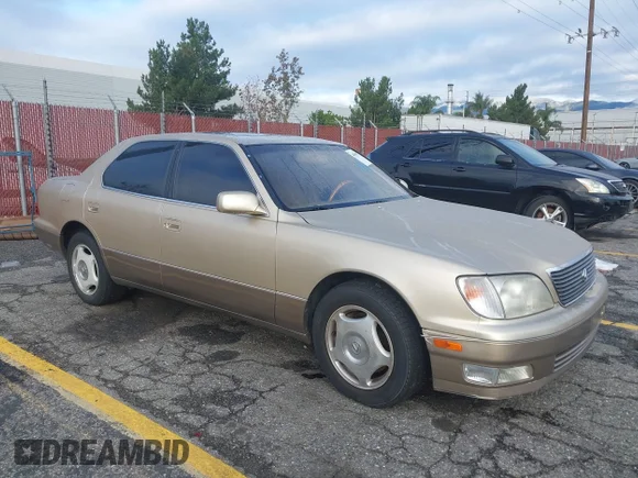 ✅ 1999 Lexus LS 400 • VIN: JT8BH28F9X0152521 • Лот: 44064571. Опубліковано раніше на IAAI з пробігом 249 110 миль. Безкоштовний доступ до архіву аукціонних продажів зі США та докладний звіт про історію автомобіля на DreamBid. Зображення 1.