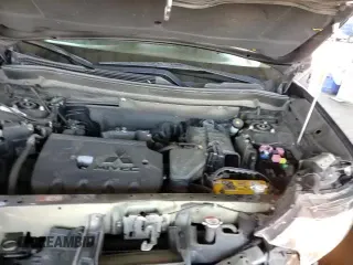 2019 Mitsubishi Outlander ES z VIN JA4AD2A30KZ007004, wystawiony jako Copart lot #69966115 z przebiegiem 89 757 mil mil oraz Szkoda całkowita • Salvage title. Historia ofert i sprzedaży dostępna na DreamBid. Obrazek 14.