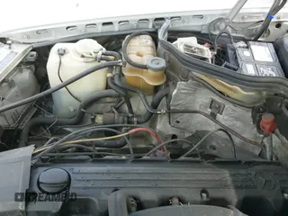 ✅ 1992 Mercedes-Benz 300 E • VIN: WDBEA30D3NB588641 • Лот: 42077960. Опубликован ранее на IAAI с пробегом 154 165 миль. Бесплатный доступ к архиву аукционных продаж из США и подробный отчёт об истории автомобиля на DreamBid. Изображение 13.