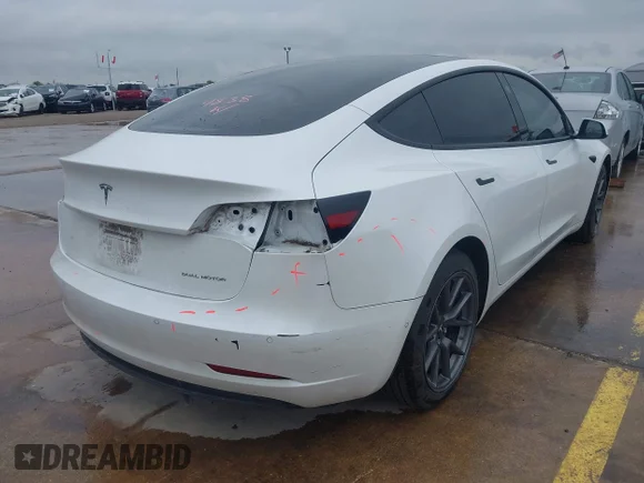 ✅ 2021 Tesla Model 3 Long Range • VIN: 5YJ3E1EB7MF059567 • Lot: 44902642. Listed on IAAI with 58,522 mi. Free auction sales archive from the USA and detailed vehicle history report at DreamBid. Image 4.