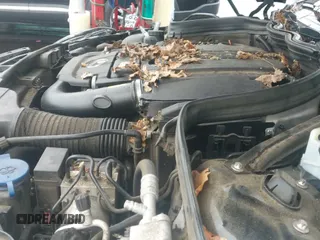 ✅ 2014 Mercedes-Benz C 250 • VIN: WDDGJ4HB5EG289213 • Lot: 42933366. Wystawiony na IAAI z przebiegiem 125 396 mil. Bezpłatny archiwum sprzedaży aukcyjnych z USA i szczegółowy raport historii pojazdu na DreamBid. Zdjęcie 12.