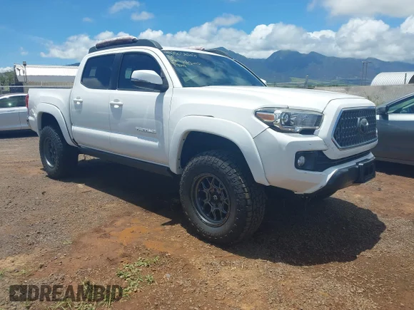 ✅ 2018 Toyota Tacoma TRD Off Road • VIN: 3TMCZ5AN1JM144472 • Лот: 44863668. Опубликован ранее на IAAI с пробегом 66 656 миль. Бесплатный доступ к архиву аукционных продаж из США и подробный отчёт об истории автомобиля на DreamBid. Изображение 1.