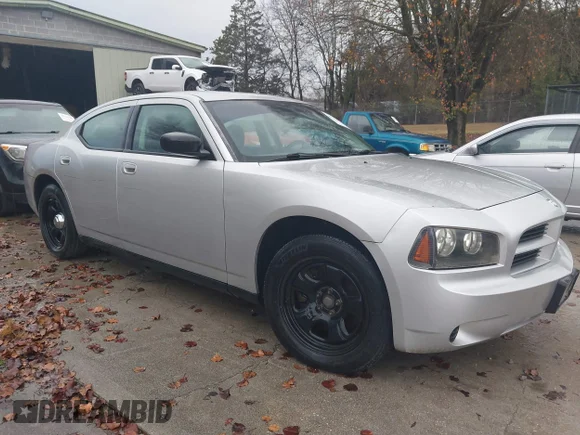 ✅ 2009 Dodge Charger Police • VIN: 2B3LA43T79H570532 • Лот: 43797384. Опубліковано раніше на IAAI з пробігом 200 202 миль. Безкоштовний доступ до архіву аукціонних продажів зі США та докладний звіт про історію автомобіля на DreamBid. Зображення 1.