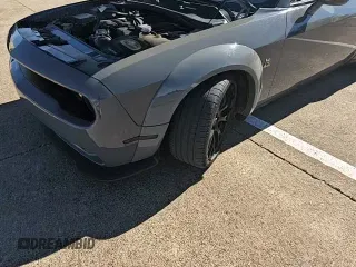 ✅ 2018 Dodge Challenger R/T Scat Pack • VIN: 2C3CDZFJ5JH161130 • Лот: 94711625. Опубликован ранее на Copart с пробегом 83 855 миль. Бесплатный доступ к архиву аукционных продаж из США и подробный отчёт об истории автомобиля на DreamBid. Изображение 11.