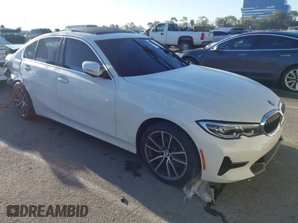 ✅ 2022 BMW 3 Series 330i • VIN: 3MW5R1J00N8C31443 • Lot: 44660732. Listed on IAAI with 55,295 mi. Free auction sales archive from the USA and detailed vehicle history report at DreamBid. Image 1.