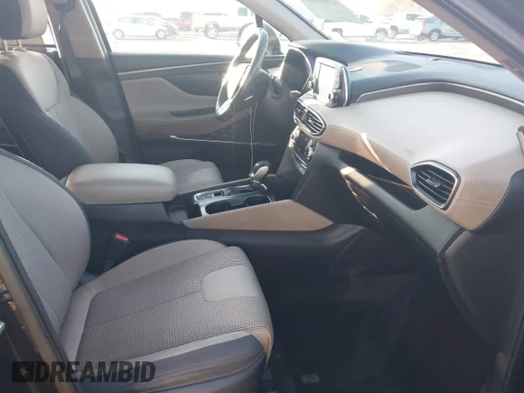 ✅ 2019 Hyundai Santa Fe SEL • VIN: 5NMS33ADXKH025932 • Lot: 43901885. Listed on IAAI with 87,516 mi. Free auction sales archive from the USA and detailed vehicle history report at DreamBid. Image 5.