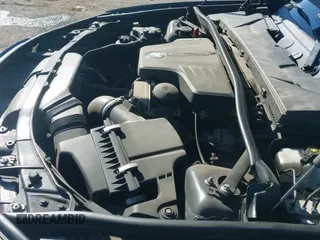 ✅ 2015 BMW X1 xDrive28i • VIN: WBAVL1C56FVY41470 • Lot: 43482324. Listed on IAAI with 127,351 mi. Free auction sales archive from the USA and detailed vehicle history report at DreamBid. Image 19.