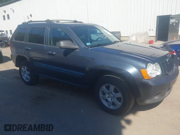 ✅ 2008 Jeep Grand Cherokee Laredo • VIN: 1J8HR48M18C174945 • Lot: 43180220. Listed on IAAI with 256,607 mi. Free auction sales archive from the USA and detailed vehicle history report at DreamBid. Image 1.