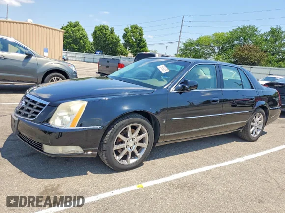 ✅ 2006 Cadillac DTS 1SE • VIN: 1G6KD57906U159023 • Lot: 53450056. Listed on Copart with 195,680 mi. Free auction sales archive from the USA and detailed vehicle history report at DreamBid. Image 1.