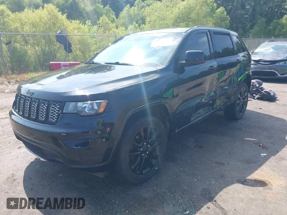✅ 2017 Jeep Grand Cherokee Altitude • VIN: 1C4RJEAG6HC883125 • Lot: 42780306. Listed on IAAI with 129,688 mi. Free auction sales archive from the USA and detailed vehicle history report at DreamBid. Image 2.