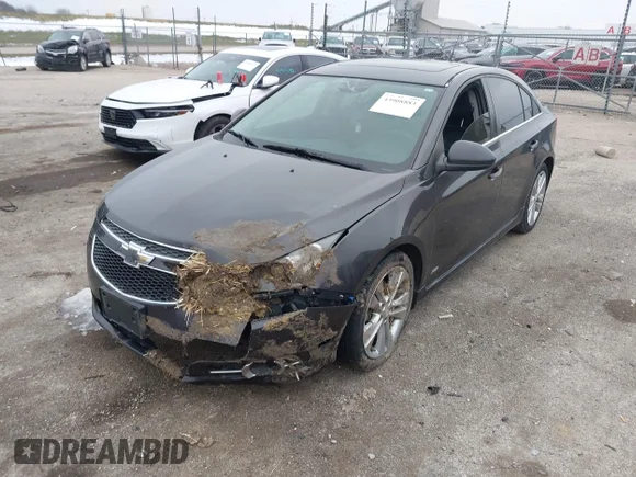 ✅ 2014 Chevrolet Cruze LTZ • VIN: 1G1PG5SB7E7256827 • Lot: 43908883. Wystawiony na IAAI z przebiegiem 54 260 mil. Bezpłatny archiwum sprzedaży aukcyjnych z USA i szczegółowy raport historii pojazdu na DreamBid. Zdjęcie 2.