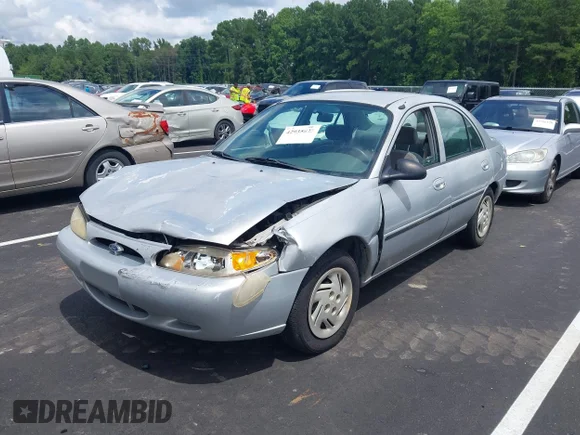 ✅ 1999 Ford Escort LX • VIN: 1FAFP10P6XW164410 • Lot: 42935825. Wystawiony na IAAI z przebiegiem 159 409 mil. Bezpłatny archiwum sprzedaży aukcyjnych z USA i szczegółowy raport historii pojazdu na DreamBid. Zdjęcie 2.