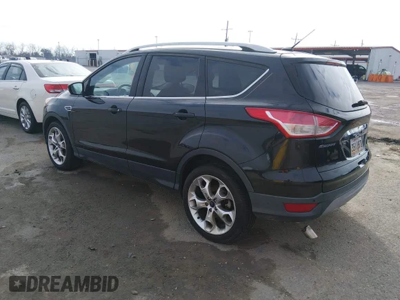 ✅ 2014 Ford Escape Titanium • VIN: 1FMCU9J91EUB11462 • Lot: 44393369. Listed on IAAI with 97,841 mi. Free auction sales archive from the USA and detailed vehicle history report at DreamBid. Image 3.