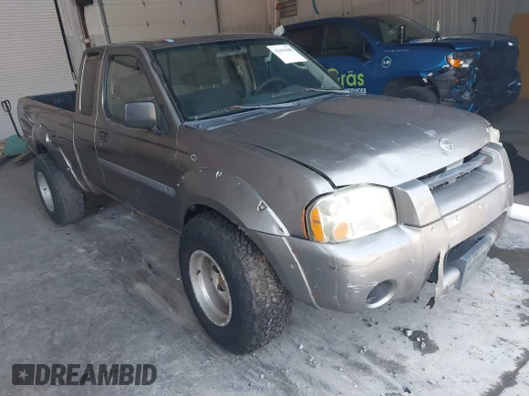 ✅ 2003 Nissan Frontier XE • VIN: 1N6ED26Y03C422840 • Lot: 42591608. Listed on IAAI with 213,732 mi. Free auction sales archive from the USA and detailed vehicle history report at DreamBid. Image 1.
