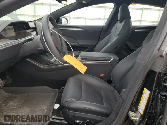 ✅ 2023 Tesla Model S Plaid • VIN: 5YJSA1E61PF515660 • Lot: 78241954. Listed on Copart with 18,628 mi. Free auction sales archive from the USA and detailed vehicle history report at DreamBid. Image 7.