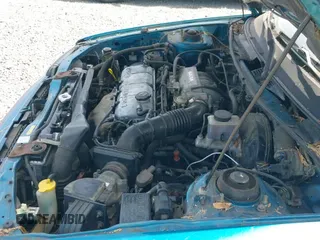 ✅ 1994 Mazda Protege DX • VIN: JM1BG224XR0709466 • Lot: 42413420. Listed on IAAI with 65,828 mi. Free auction sales archive from the USA and detailed vehicle history report at DreamBid. Image 12.