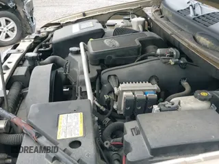 ✅ 2005 GMC Envoy SLT • VIN: 1GKDS13S452141376 • Lot: 42095025. Listed on IAAI with 198,911 mi. Free auction sales archive from the USA and detailed vehicle history report at DreamBid. Image 12.