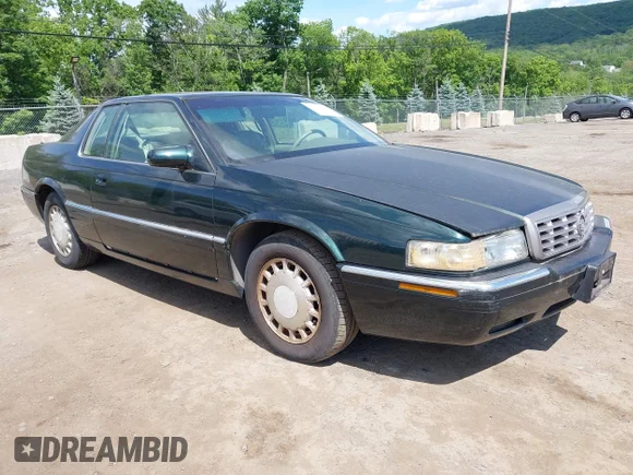 ✅ 1996 Cadillac Eldorado Touring • VIN: 1G6ET1290TU614495 • Lot: 45269624. Wystawiony na IAAI z przebiegiem 71 094 mil. Bezpłatny archiwum sprzedaży aukcyjnych z USA i szczegółowy raport historii pojazdu na DreamBid. Zdjęcie 1.
