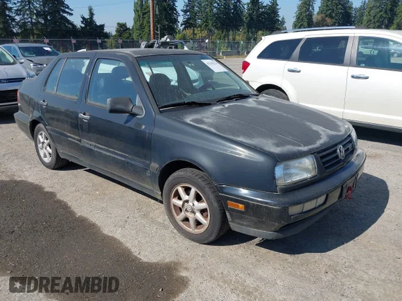 ✅ 1998 Volkswagen Jetta TDI • VIN: 3VWRF81H3WM123464 • Lot: 43296274. Listed on IAAI with 237,469 mi. Free auction sales archive from the USA and detailed vehicle history report at DreamBid. Image 1.