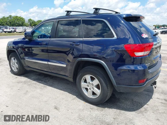 ✅ 2013 Jeep Grand Cherokee Laredo • VIN: 1C4RJEAGXDC610716 • Lot: 45115166. Listed on IAAI with 79,516 mi. Free auction sales archive from the USA and detailed vehicle history report at DreamBid. Image 3.