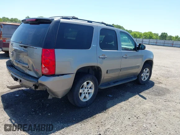 ✅ 2009 GMC Yukon SLT 4SB • VIN: 1GKFK33019R243153 • Lot: 42266702. Wystawiony na IAAI z przebiegiem 205 741 mil. Bezpłatny archiwum sprzedaży aukcyjnych z USA i szczegółowy raport historii pojazdu na DreamBid. Zdjęcie 4.