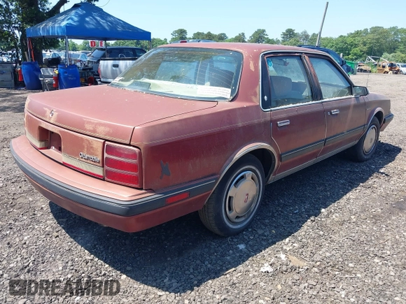 ✅ 1991 Oldsmobile Cutlass Ciera • VIN: 2G3AJ54N6M2302241 • Lot: 42524633. Wystawiony na IAAI z przebiegiem 146 853 mil. Bezpłatny archiwum sprzedaży aukcyjnych z USA i szczegółowy raport historii pojazdu na DreamBid. Zdjęcie 4.