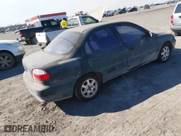 ✅ 2000 Kia Sephia • VIN: KNAFB1210Y5867300 • Lot: 44458633. Wystawiony na IAAI z przebiegiem 162 469 mil. Bezpłatny archiwum sprzedaży aukcyjnych z USA i szczegółowy raport historii pojazdu na DreamBid. Zdjęcie 4.