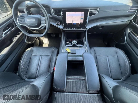 ✅ 2023 Jeep Wagoneer Series II • VIN: 1C4SJSBP9PS557564 • Lot: 45087934. Listed on IAAI with 35,164 mi. Free auction sales archive from the USA and detailed vehicle history report at DreamBid. Image 8.