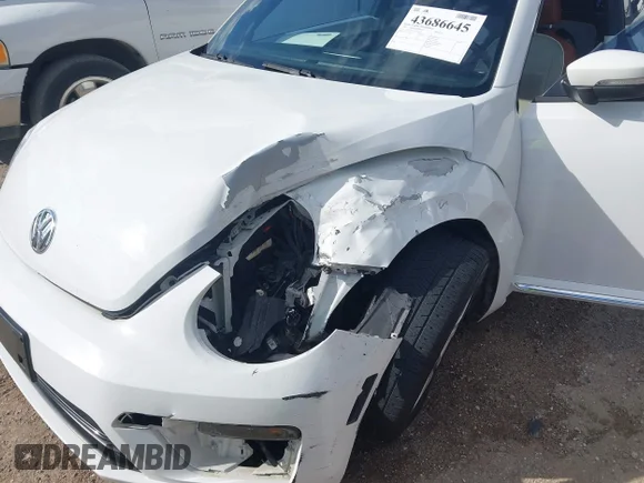 ✅ 2017 Volkswagen Beetle Fleet • VIN: 3VWF17ATXHM631210 • Lot: 43686645. Listed on IAAI with 127,909 mi. Free auction sales archive from the USA and detailed vehicle history report at DreamBid. Image 6.