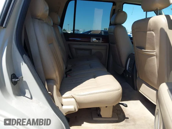 ✅ 2005 Lincoln Navigator Luxury • VIN: 5LMFU27515LJ07973 • Lot: 42922307. Listed on IAAI with 164,411 mi. Free auction sales archive from the USA and detailed vehicle history report at DreamBid. Image 8.