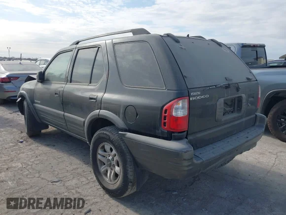 ✅ 2003 Isuzu Rodeo • VIN: 4S2DM58W434308446 • Лот: 44133935. Опубліковано раніше на IAAI з пробігом 206 953 миль. Безкоштовний доступ до архіву аукціонних продажів зі США та докладний звіт про історію автомобіля на DreamBid. Зображення 3.