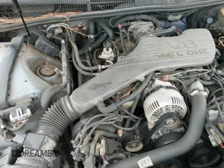 ✅ 1995 Mercury Cougar XR7 • VIN: 1MELM62W3SH600097 • Лот: 42185484. Опубликован ранее на IAAI с пробегом 216 393 миль. Бесплатный доступ к архиву аукционных продаж из США и подробный отчёт об истории автомобиля на DreamBid. Изображение 12.