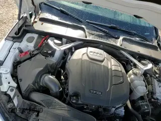 ✅ 2019 Audi A5 Premium Plus • VIN: WAUTNAF50KA053895 • Лот: 60404285. Опубликован ранее на Copart с пробегом 100 657 миль. Бесплатный доступ к архиву аукционных продаж из США и подробный отчёт об истории автомобиля на DreamBid. Изображение 13.