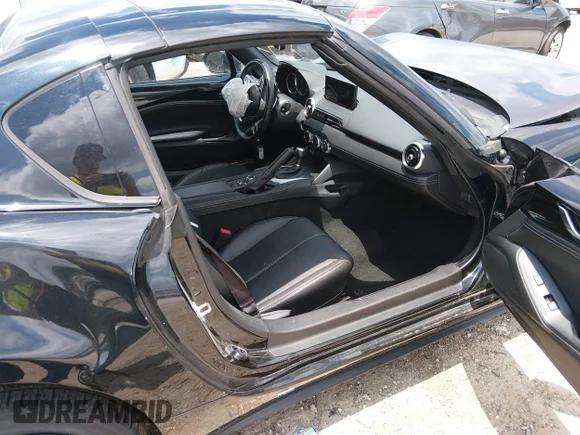 ✅ 2025 Mazda MX-5 Miata Grand Touring • VIN: JM1NDAM71S0652801 • Лот: 45184184. Опубліковано раніше на IAAI з пробігом 20 357 миль. Безкоштовний доступ до архіву аукціонних продажів зі США та докладний звіт про історію автомобіля на DreamBid. Зображення 5.