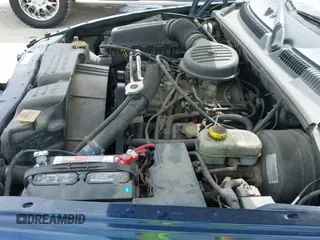 2002 Dodge Dakota Sport z VIN 1B7GL32X52S525368, wystawiony jako IAAI lot #42420709 z przebiegiem 241 497 mil mil oraz . Historia ofert i sprzedaży dostępna na DreamBid. Obrazek 20.